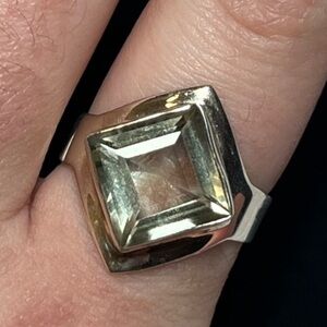 Sterling silver ring with light blue/green stone. Size 7.5